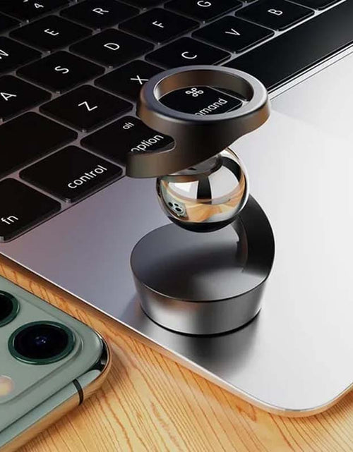 Load image into Gallery viewer, Gravity Defying Kinetic Desk Toy
